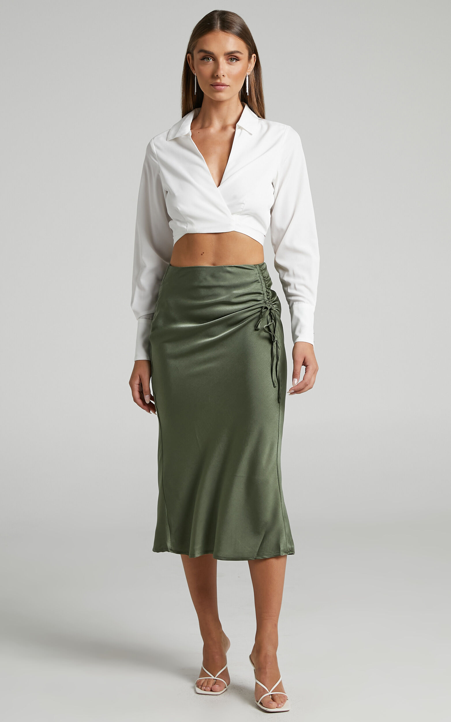 Zoë Kravitz Wears a Green Telfar Bag and Slip Skirt in NYC